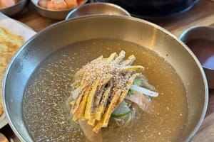 Mustard, Vinegar, and the Long Memory of Seoul's Naengmyeon Bowl